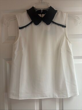 CeCe Sleeveless Ani White Blouse with black collar